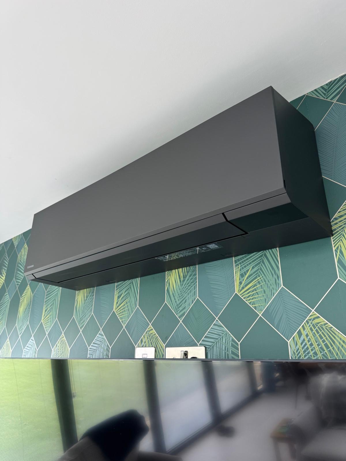 air con unit mounted to wall in london home